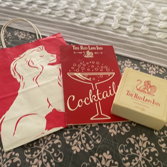Dusting powder, cocktail menu, and paper bag.   Very cool… - Picture 2 of 8